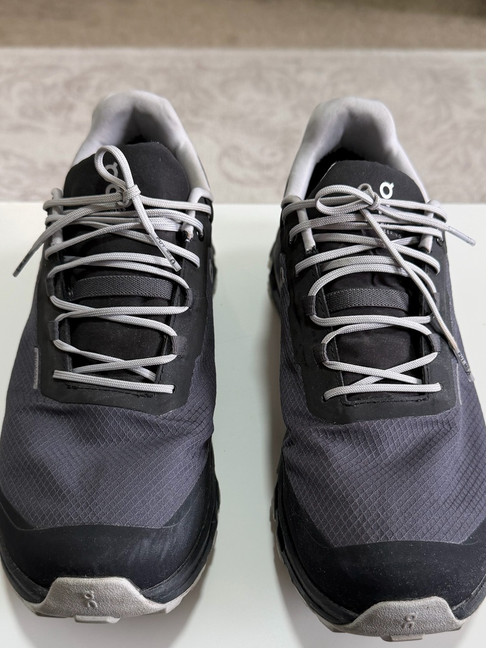 On Running Women's Trail Sneakers in Charcoal and Light Gray